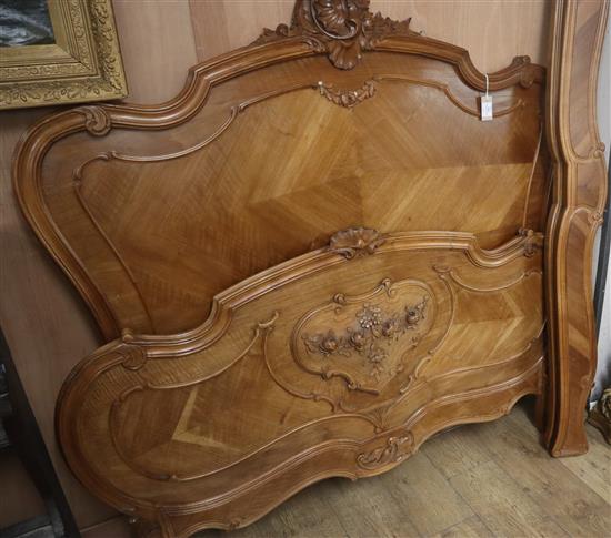 A French carved walnut double bed frame W.173cm